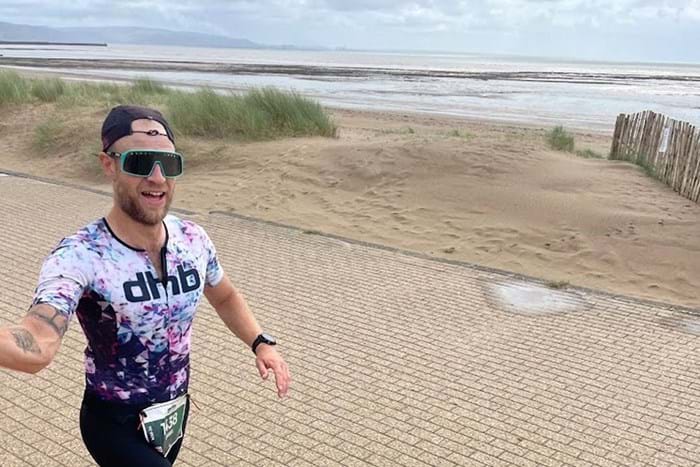 Dan Chaplen running on the beach