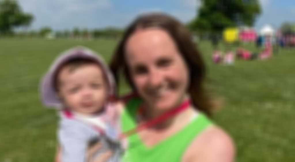 Charlie Paradise With Baby blurred out